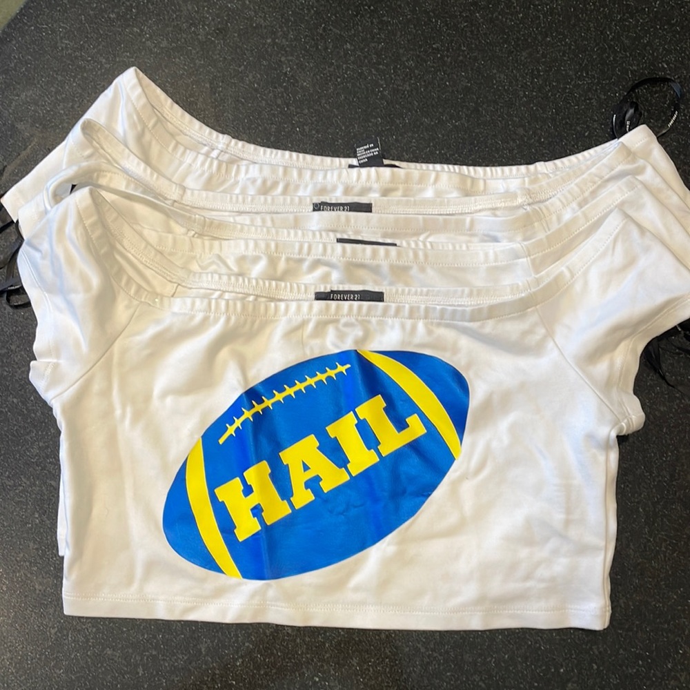Crop top.  Forever 21 brand new ,  great to wear during football season.